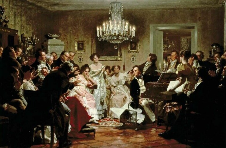 Julius Schmids «Schubertiade» (1897) Maleri av en salong-sammenkomst i Wien. (Kilde: Wikimedia Commons)